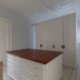 Interiorfotografie des Ankleidezimmer mit Blick in den Wohnbereich in einer Wohnung in der Jasperallee in Braunschweig für die PSC Gmyrek GmbH.